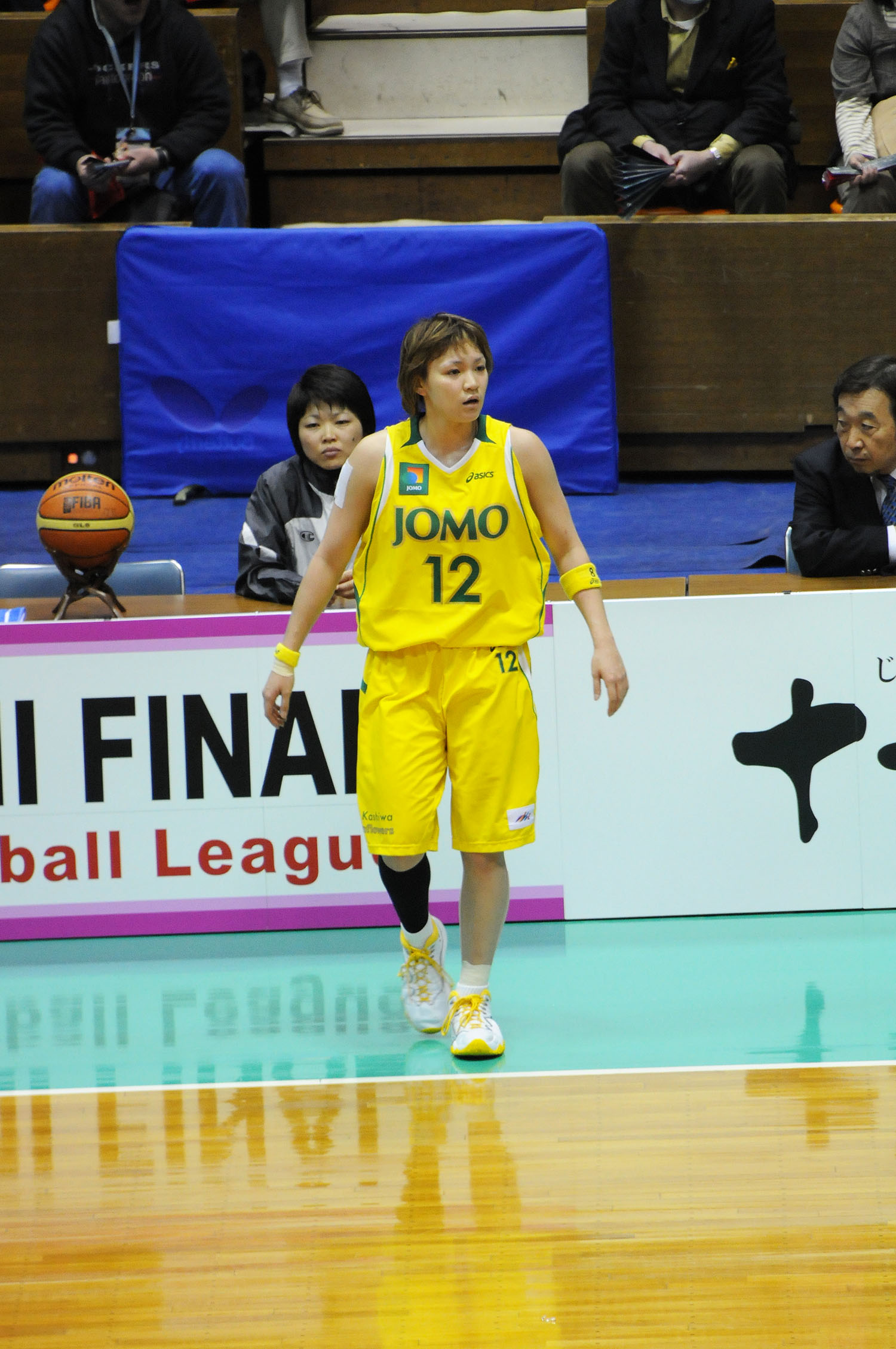 Imagem de referência relacionada a Asami Yoshida, item descrito como jogadora de basquetebol japonesa