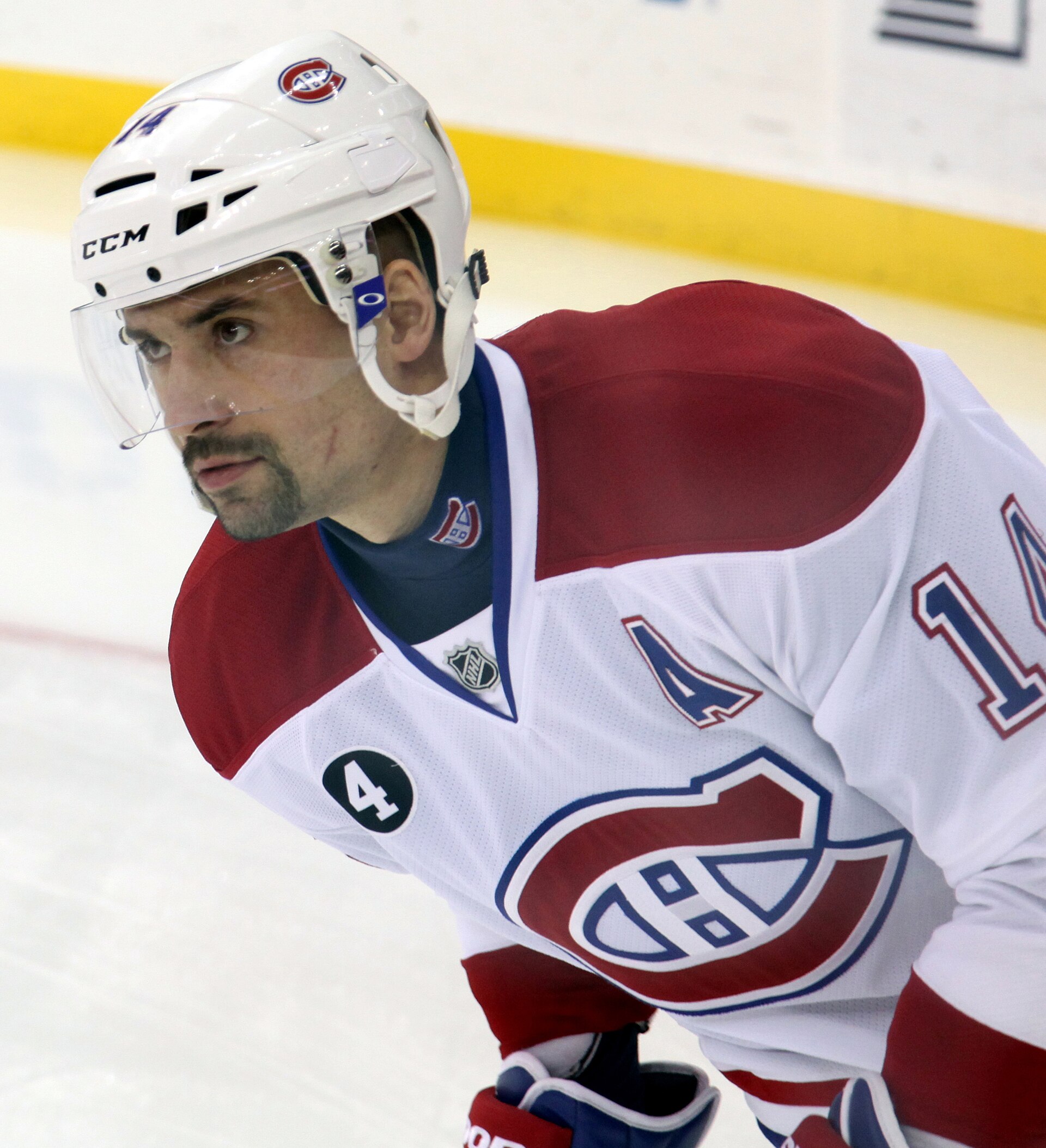 Imagem de referência de Tomáš Plekanec, descrito nos dados abertos como jogador do hoquei de gelo checo