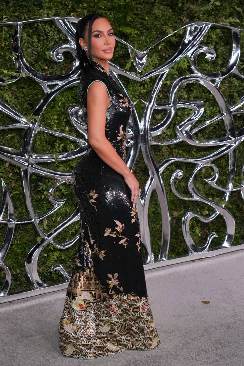 Kim Kardashian dips into the archives in shimmering floral-embroidered Saint Laurent by Tom Ford from fall 2004.