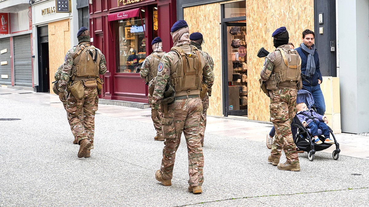 Officers walking around Paris
