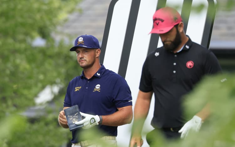 Bryson DeChambeau (L) and Jon Rahm take part in LIV Golf Indianapolis in Westfield, Indiana, August 23, 2026. (Photo by Justin Casterline / GETTY IMAGES NORTH AMERICA / Getty Images via AFP)